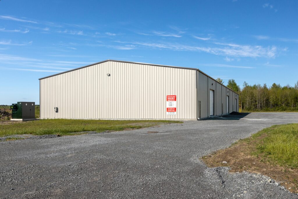 Commercial construction cost per square foot 2026 industrial warehouse building exterior example